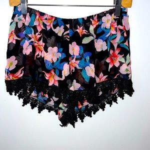 Show Me Your Mumu sheer and lace trim floral shorts